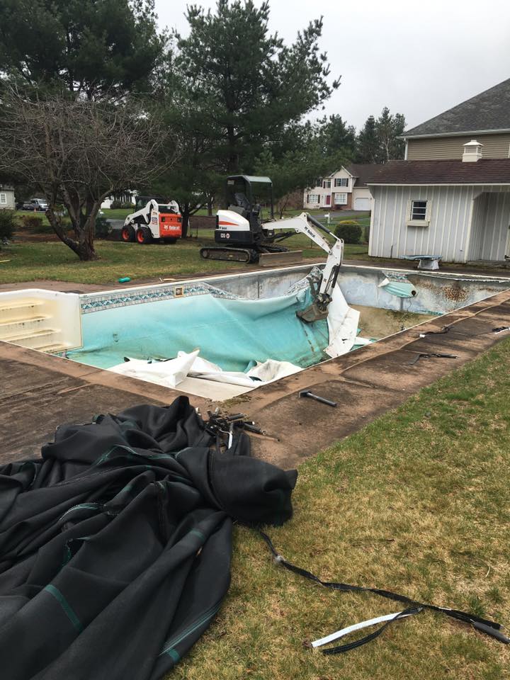 removing old swimming pool - Olson Lawncare and Landscaping Twin Cities Andover